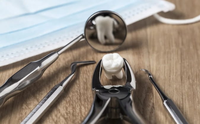 Безболісно вирвати зуб